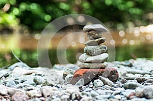 Stone balance in border river
