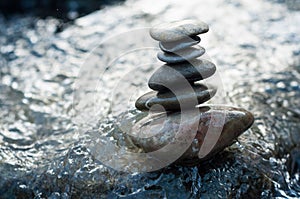 Stone balance on rocks in the river