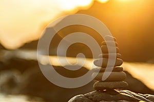 Stone balance in sunrise