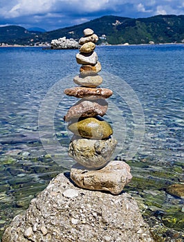 Stone balance via sea view