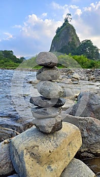 Stone balancing at the river