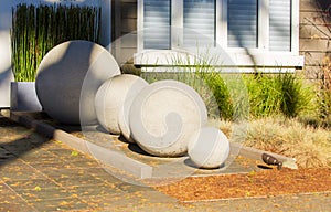 Stone balls. Garden sculpture. Curb appeal