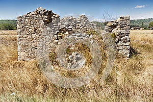 Stone Barn Ruins In A Field