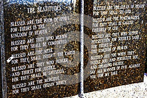 Stone of The Beatitudes at the Entrance of a Catholic Church photo