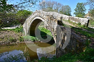 Stone Beggar`s Bridge Over the River Esk in Glaisdale