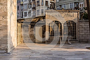 Stone bench on the terrace of Istanbul`s Nuruosmaniye Mosque. Turkey photo