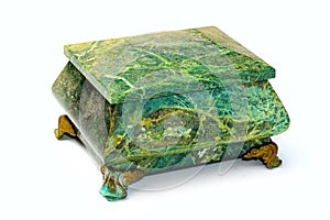 Stone box of malachite on a white background