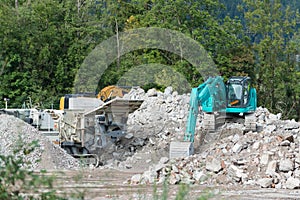 Stone breaker and shovel digger