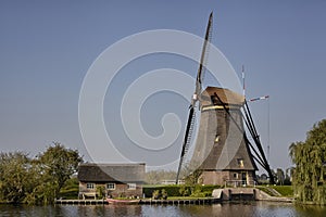 Stone brick Dutch windmill at Kinderdijk, an UNESCO world heritage site