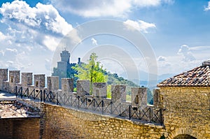 Seconda Torre La Cesta second tower on Mount Titano rock with blue sky white clouds background in Republic San Marino photo