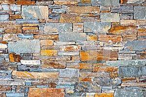 Stone brick wall pattern texture background. Asymmetrical wall of modern architecture. Background of stone wall. Texture