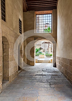 Stone bricks passage leading to the courtyard of historic Beit El Sehemy house, Cairo, Egypt photo