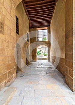 Stone bricks passage leading to the courtyard of historic Beit El Sehemy house, Cairo, Egypt photo