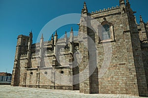 Stone bricks wall with buttresses and pinnacles on Cathedral