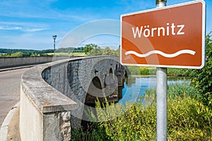 Stone bridge with arches over Wornitz river