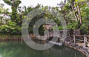 Stone bridge at Bano Grande Swim area in El Yunque National Forest, Puerto Rico photo