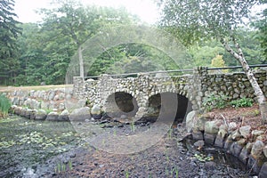 Stone bridge in D.W. Field Park, Brockton MA photo
