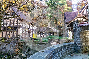 Stone bridge at the entrance to the Peles Castle in Romania