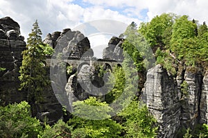 A stone bridge in Germany. Monumental rocks. Nature park.