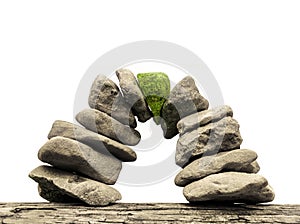 Stone bridge made of pebbles with green keystone photo