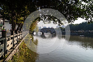 A stone bridge over the canal in Wenzhou, China in Nantang park