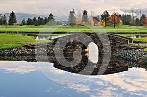 Stone bridge over creek on golf course