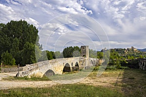 stone bridge over Ebro river in Frias, Burgos province, Castilla Leon, Spain