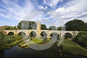 stone bridge over Ebro river in Frias, Burgos province, Castilla Leon, Spain