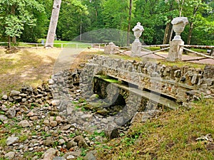 stone bridge over the pond Pavlovsk park summer day