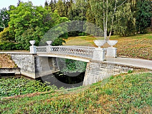stone bridge over the pond Pavlovsk park summer day