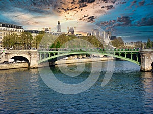 Stone bridge over Seine River in Paris, France during sunset