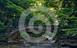 Stone bridge over a stream in Stony Brook State Park