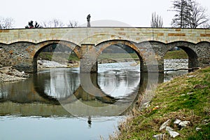 Stone bridge with the statue of St. John of Nepomuk in Litovel photo