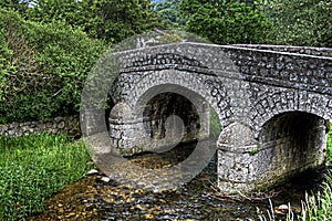 The stone bridge on the torrent photo