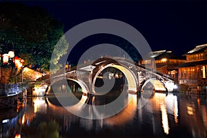 Historical Stone Bridge in Wuzhen, China photo