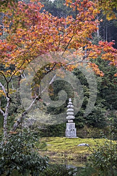 Stone buddha at carvings are inside the garden of Kinkakuji Temple Kyoto