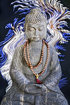 Stone Buddha statue, blue and white lights