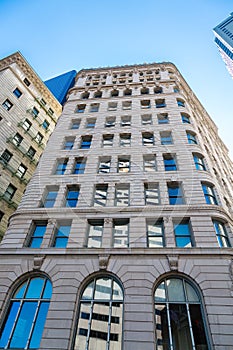 Stone Building in Boston with White Building Reflected