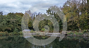 Stone building, on a lake shore in the forest