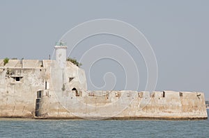 Stone building of Pani Kotha prison in the middle of the arabian sea in Diu India