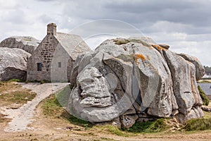 Stone buliding Meneham house in Brittany, France