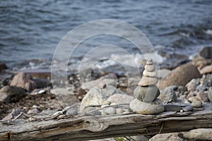 Stone Cairn Balance Art On Baltic Sea Coast