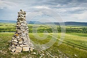 Stone cairn in Khakassia photo