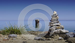 Stone cairn at Northern Europe coastline