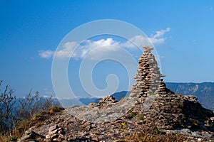 Stone Cairn in South Tyrol above Bolzano. Nice Sunny day in SÃÂ¼dtirol on a Mountain photo