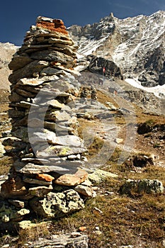 Stone cairn in Swiss Alps