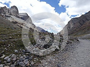 Stone cairns alongside circumambulation route around Mt Kailash , Lha Chu valley, Tibet Autonomous Region photo