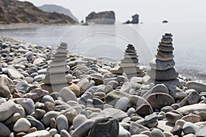 Stone Cairns with Aphrodite\'s Rock in Background