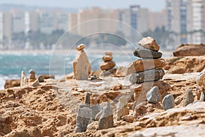 Stone cairns on the beach of the Agua Amarga salt marsh