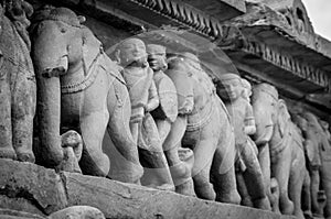 Stone carved erotic bas relief in Hindu temple in Khajuraho, India